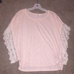 Lace trimmed pink blouse
